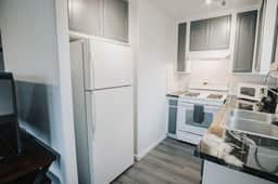 Gorgeous Upstairs Studio with Patio and Laundry - Image 5